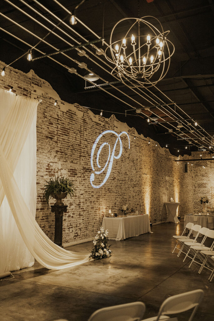 Venue at the Edge decorated for a moody modern wedding